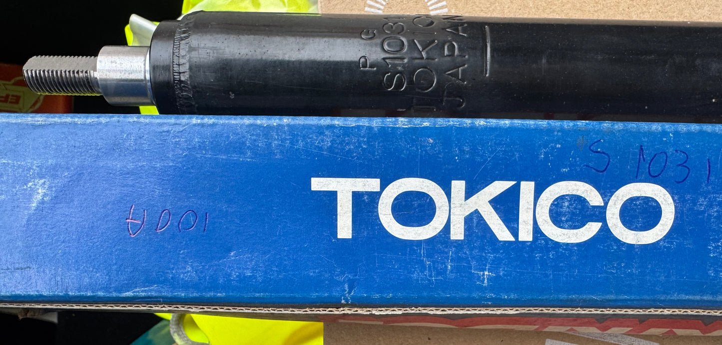Par de Cargas Amortecedores Frente p/a 100A (Tokico S1031)